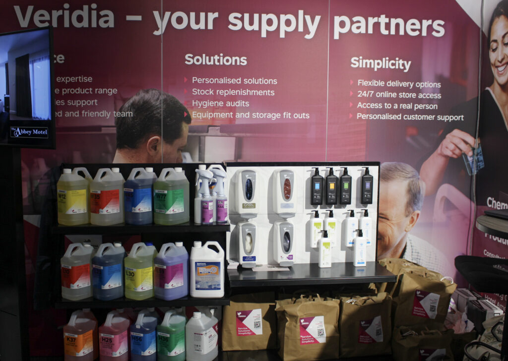 Veridia display of colour coded chemical range (left) and amenities dispenser ranges (right)