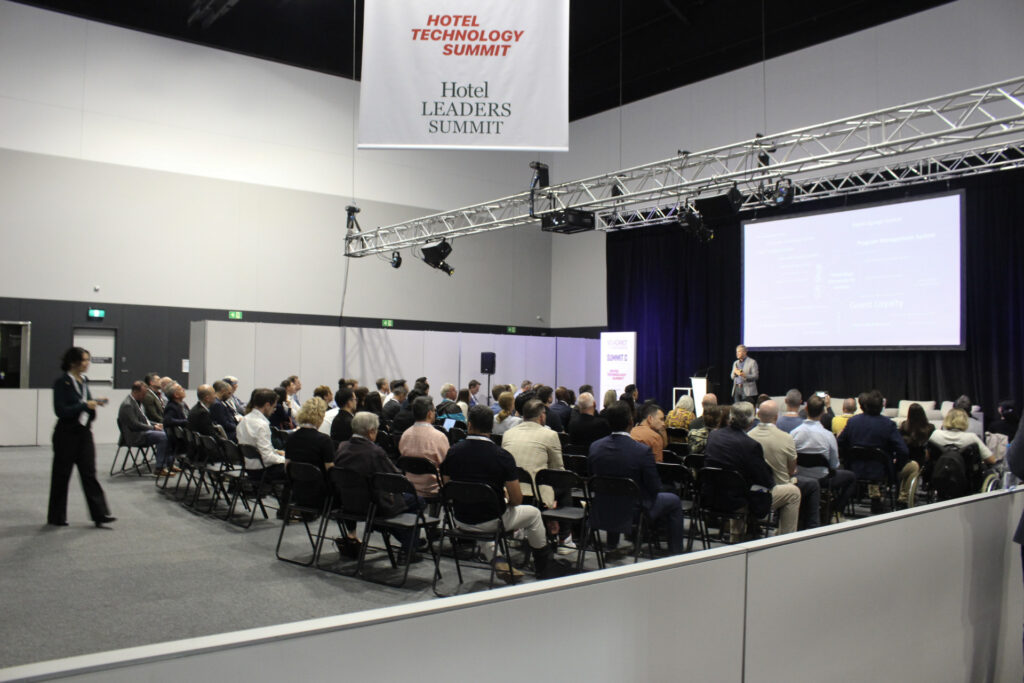 Audience listening to a presentation at NoVacancy Summit C